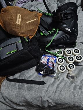 Black Inline Skates with Green Laces and Fuel Carry Bag And Pads And Extra Wheel